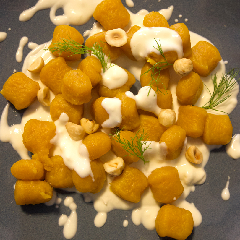 Gnocchi alla Zucca con fonduta di robiola e nocciole